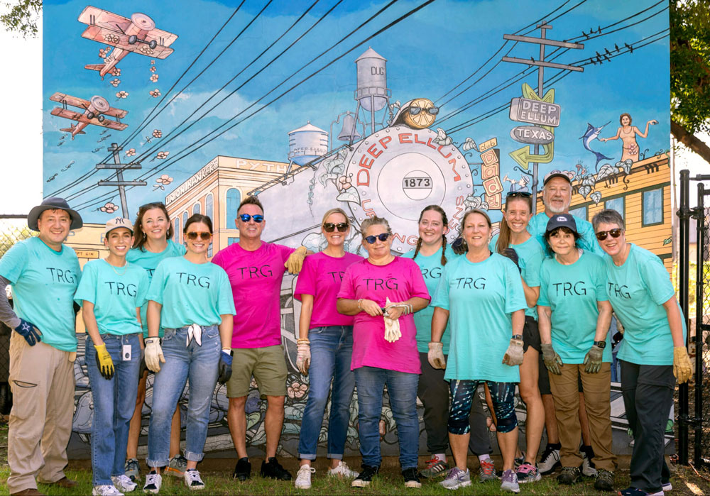 Group with Deep Ellum mural